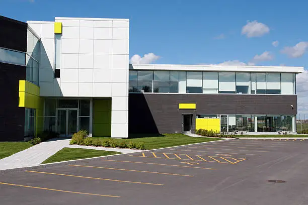 commercial painting in Cape Cod, MA for an office with exterior panels and dark accent walls