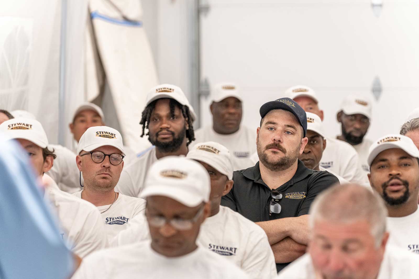 Stewart Painting employees sitting in meeting