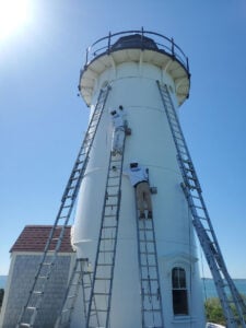 Falmouth Lighthouse being painted